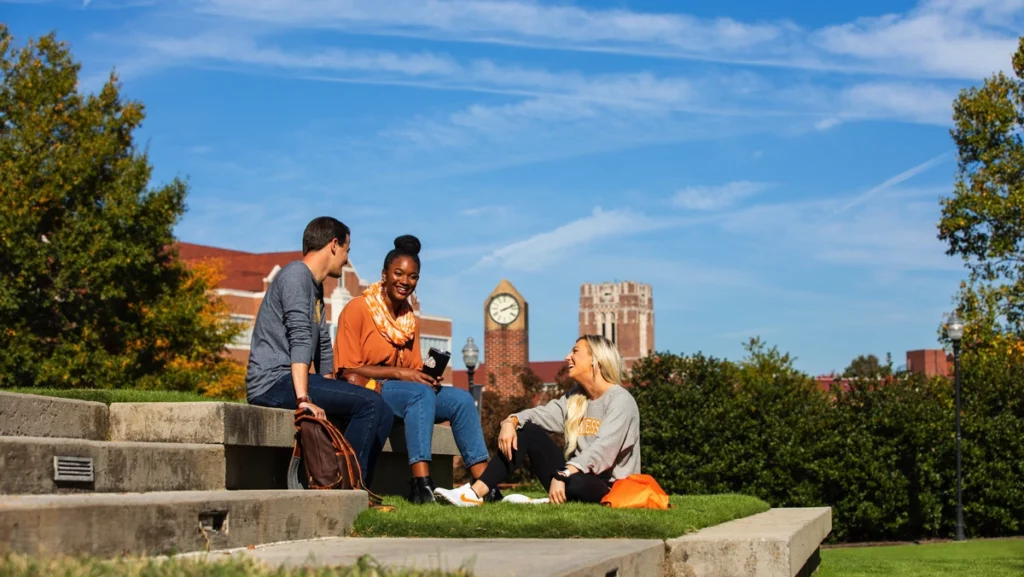 Students chatting outside on the UT campus.